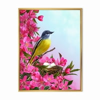 DesignArt 'mala žuta ptica u blizini gnijezda s tradicionalnim uokvirenim platnenim zglobom ružičastih cvjetova,